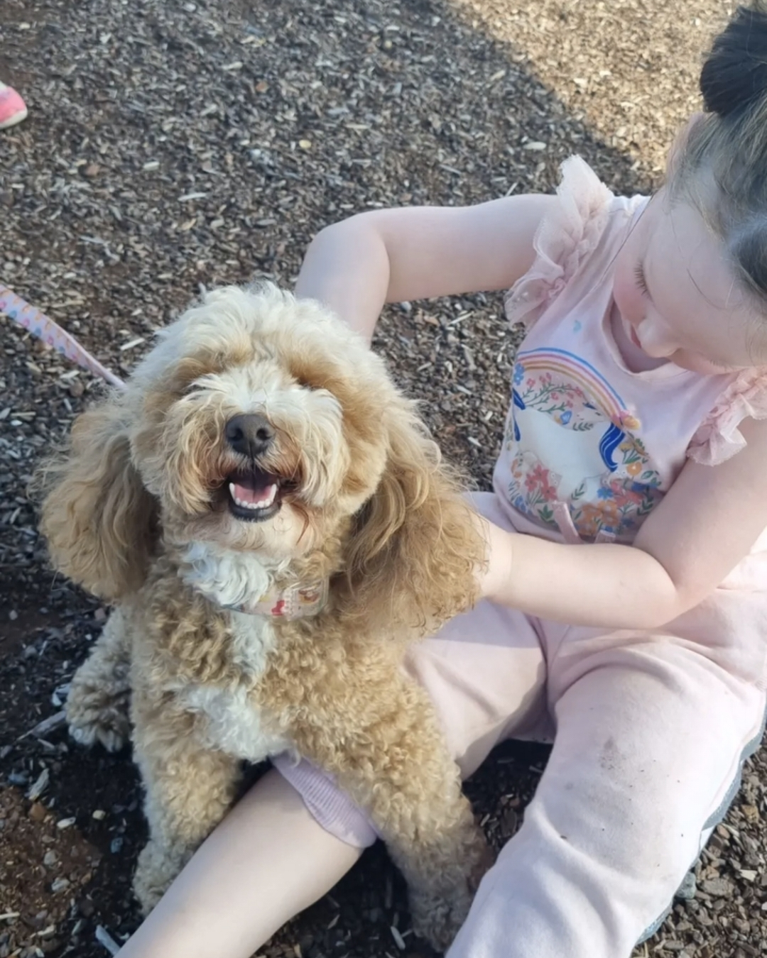 Paloma with a Pawloma guest at the park